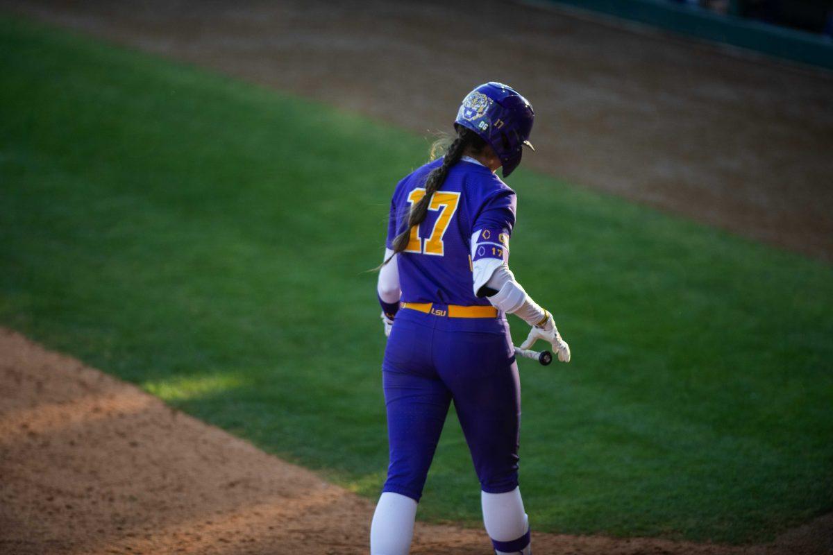 <p>LSU softball redshirt sophomore infielder Taylor Pleasants (17) walks back to the dugout Friday, Feb. 11, 2022, during the Tigers' 3-0 win against South Alabama at Tiger Park in Baton Rouge, La.</p>