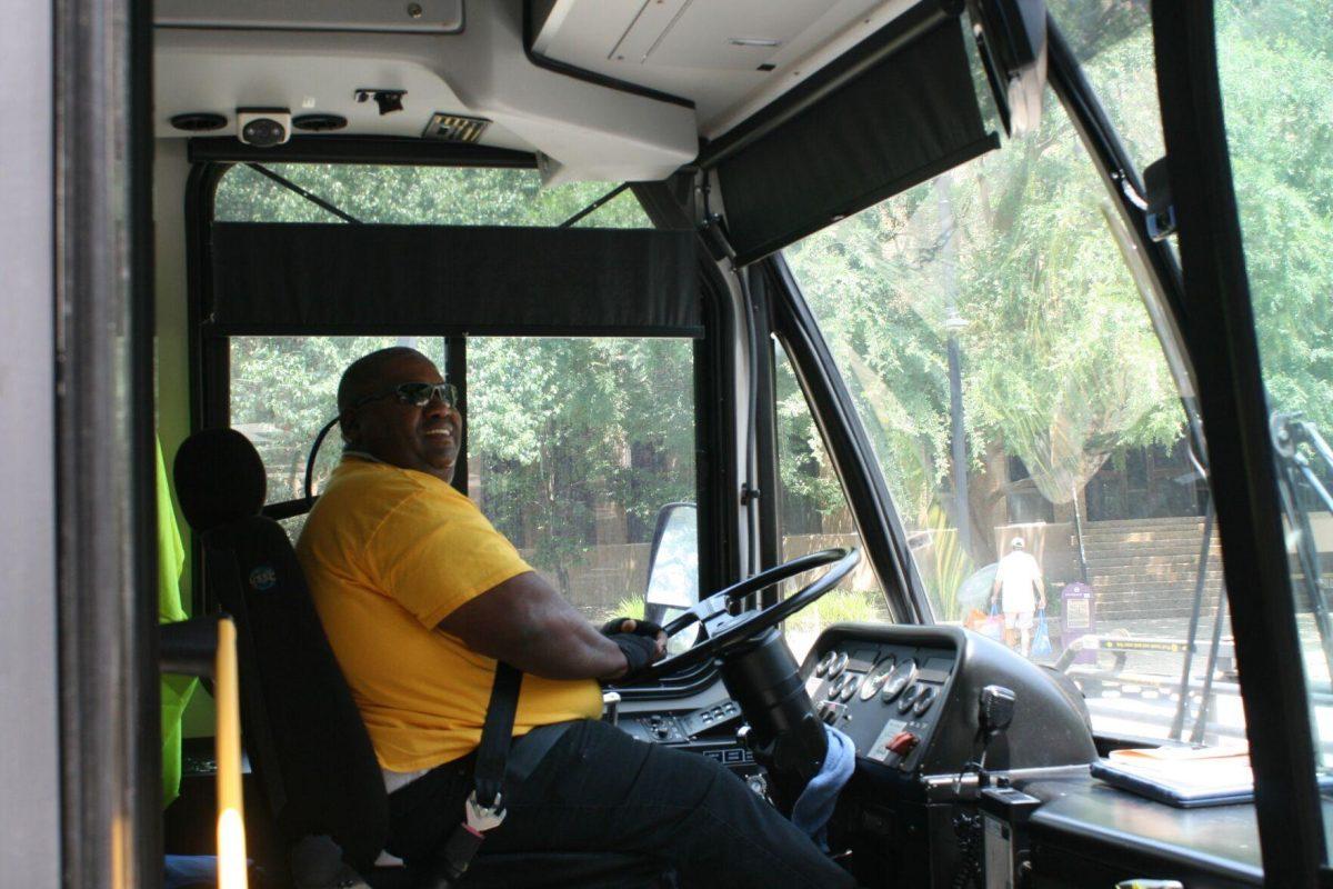 Tiger Trails bus driver David Alfrod smiles at a stop on Friday, May 20, 2022. Alfrod drives the Highland-Burbank route.