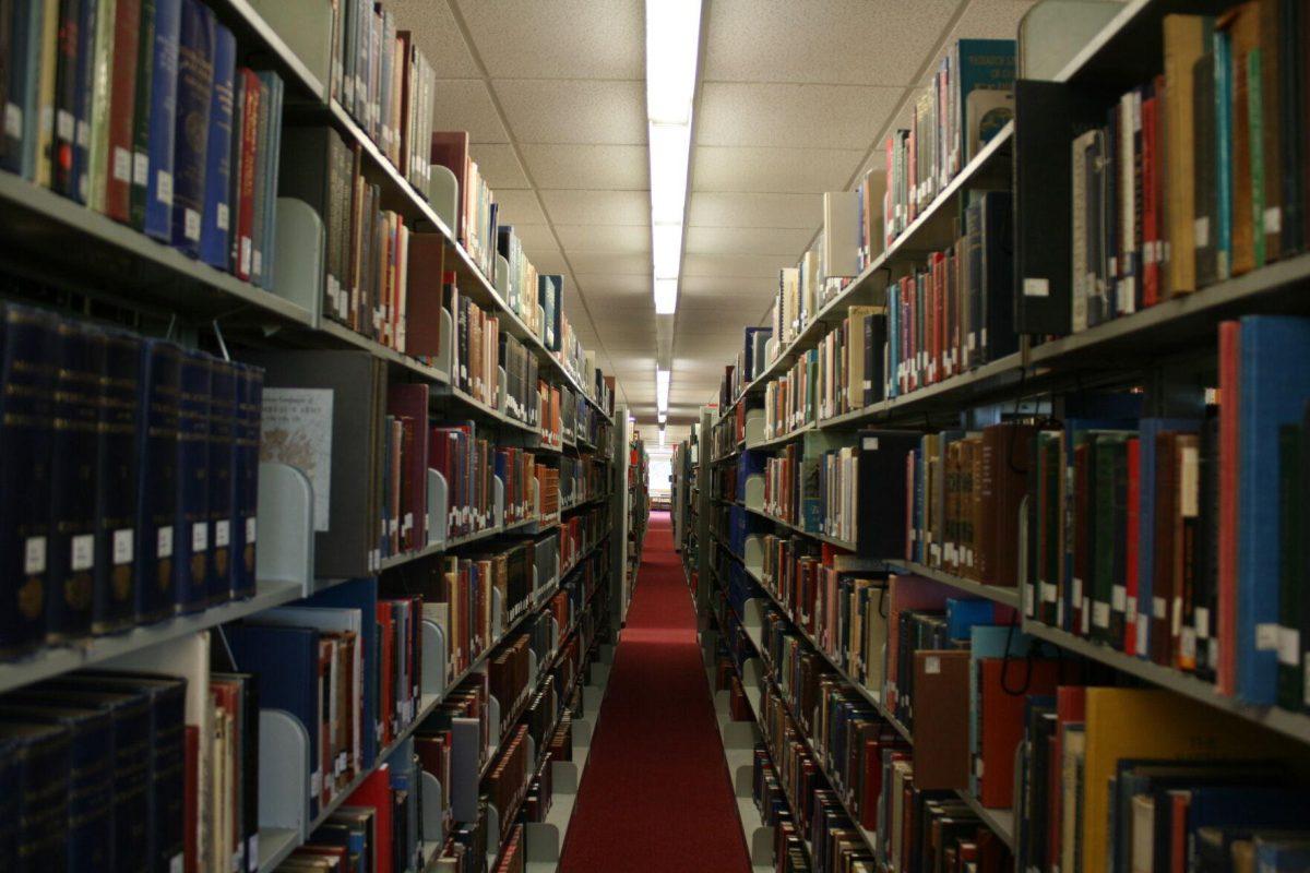 An empty corridor between shelves of the LSU Library's third floor on May 21, 2022.&#160;