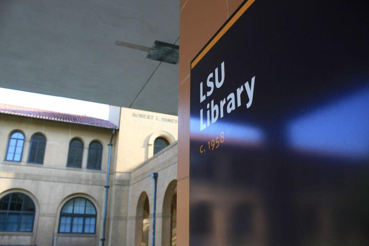 A sign to the LSU Library faces toward memorial tower on May 21, 2022.