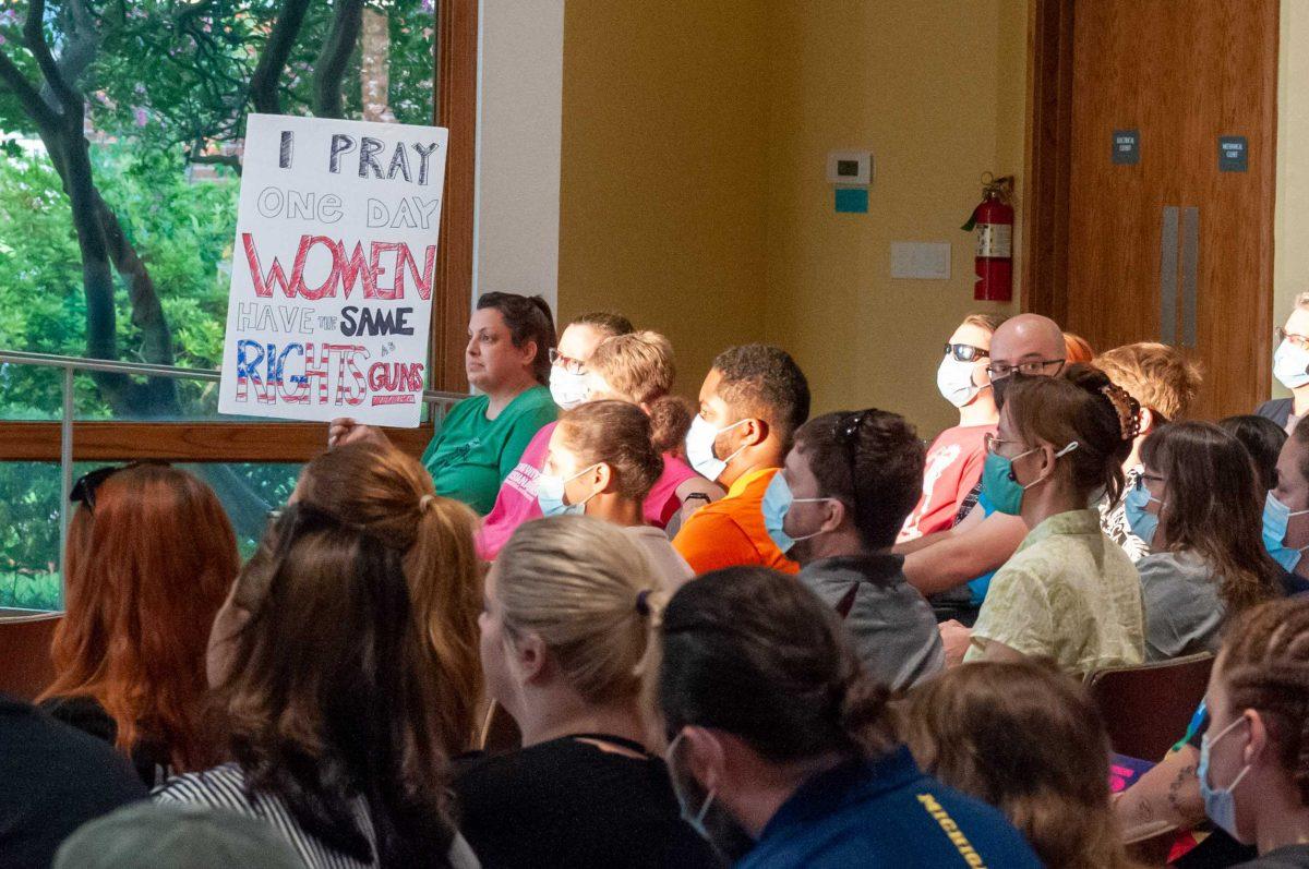 Advocates brought signs to show support for reproductive rights, Friday, June 24.