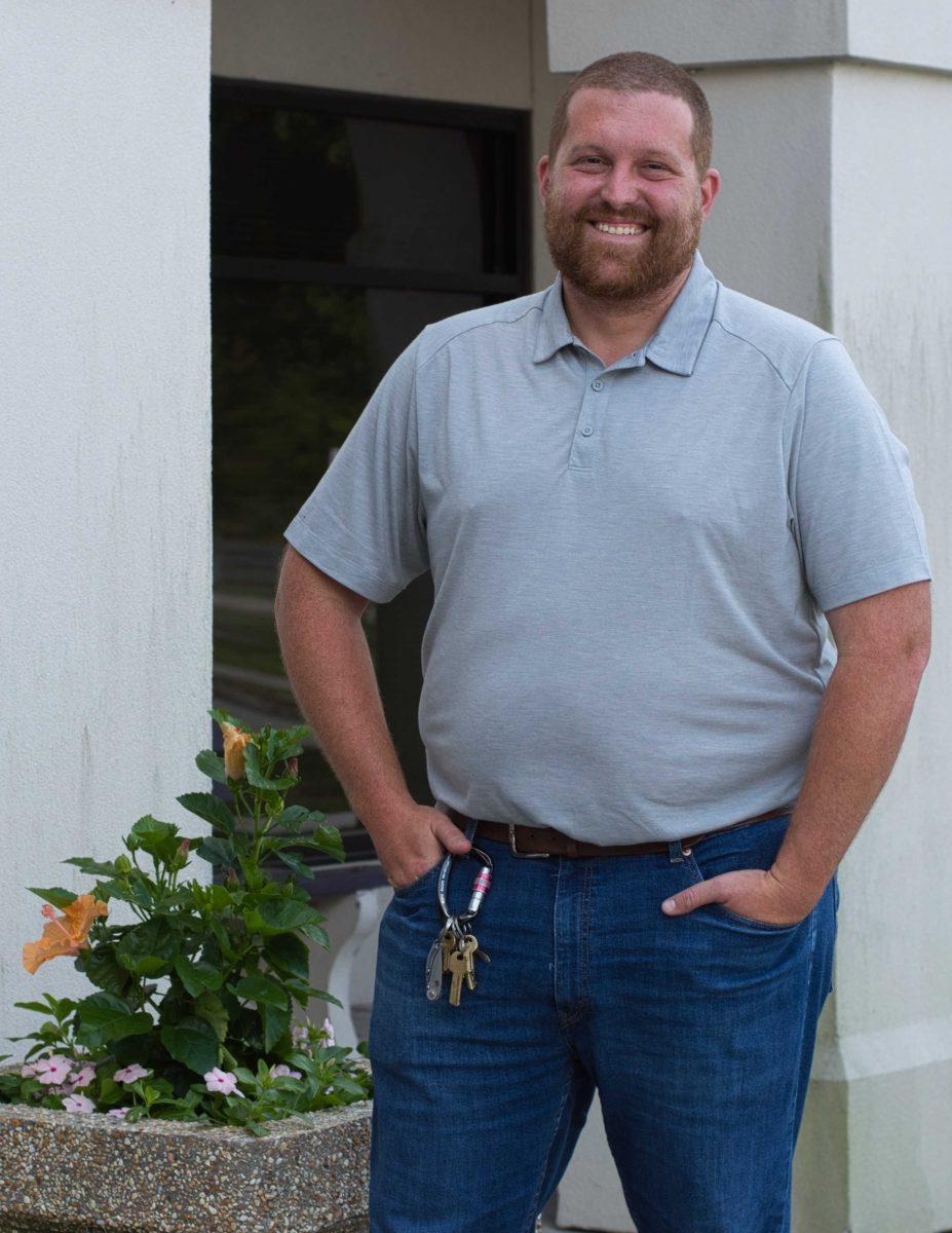 Ethan Mott poses for a picture outside facility services.&#160;