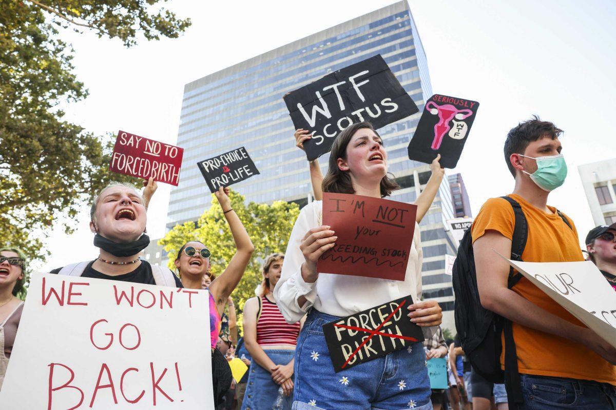 Abortion-rights supporters protest on the steps of the John Minor Wisdom United States of Appeals Fifth Circuit Building after the Supreme Court decision to overturn Roe v. Wade, in New Orleans, Friday, June 24, 2022. (Sophia Germer/The Times-Picayune/The New Orleans Advocate via AP)