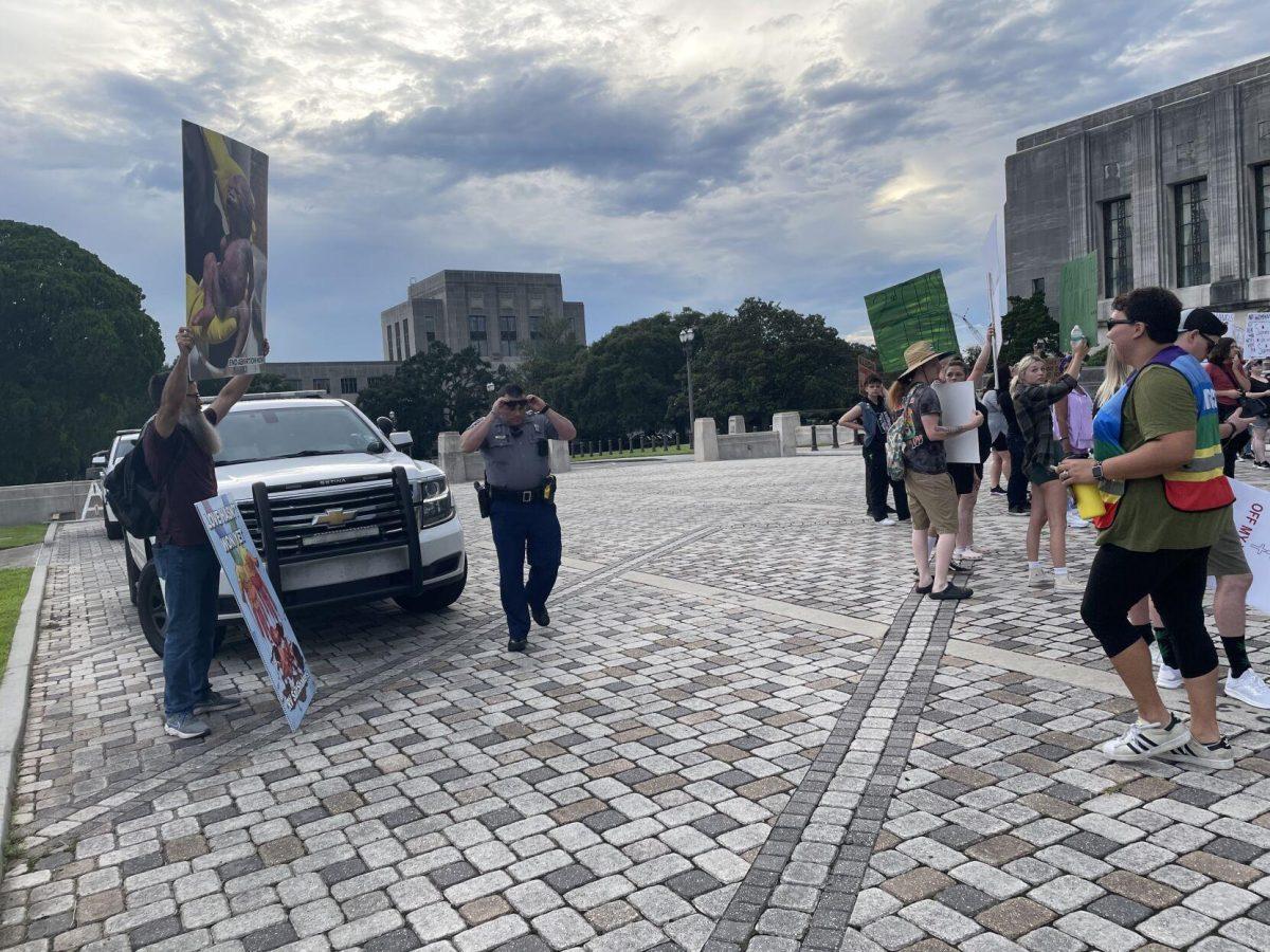 Anti-abortion protestor (left) argue with abortion-rights protestors at an abortion-rights protest at the Louisiana State Capitol on June 30, 2022