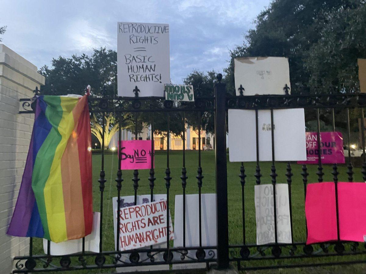 Abortion-rights protestors left their signs on the gate of the Louisiana governor's mansion on June 30, 2022