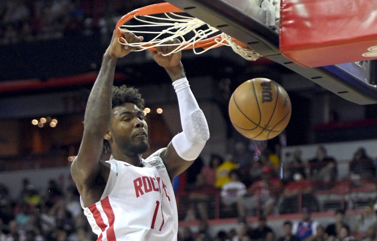 Houston Rockets' Tari Eason dunks against the Oklahoma City Thunder during the first half of an NBA summer league basketball game Saturday, July 9, 2022, in Las Vegas. (AP Photo/David Becker)