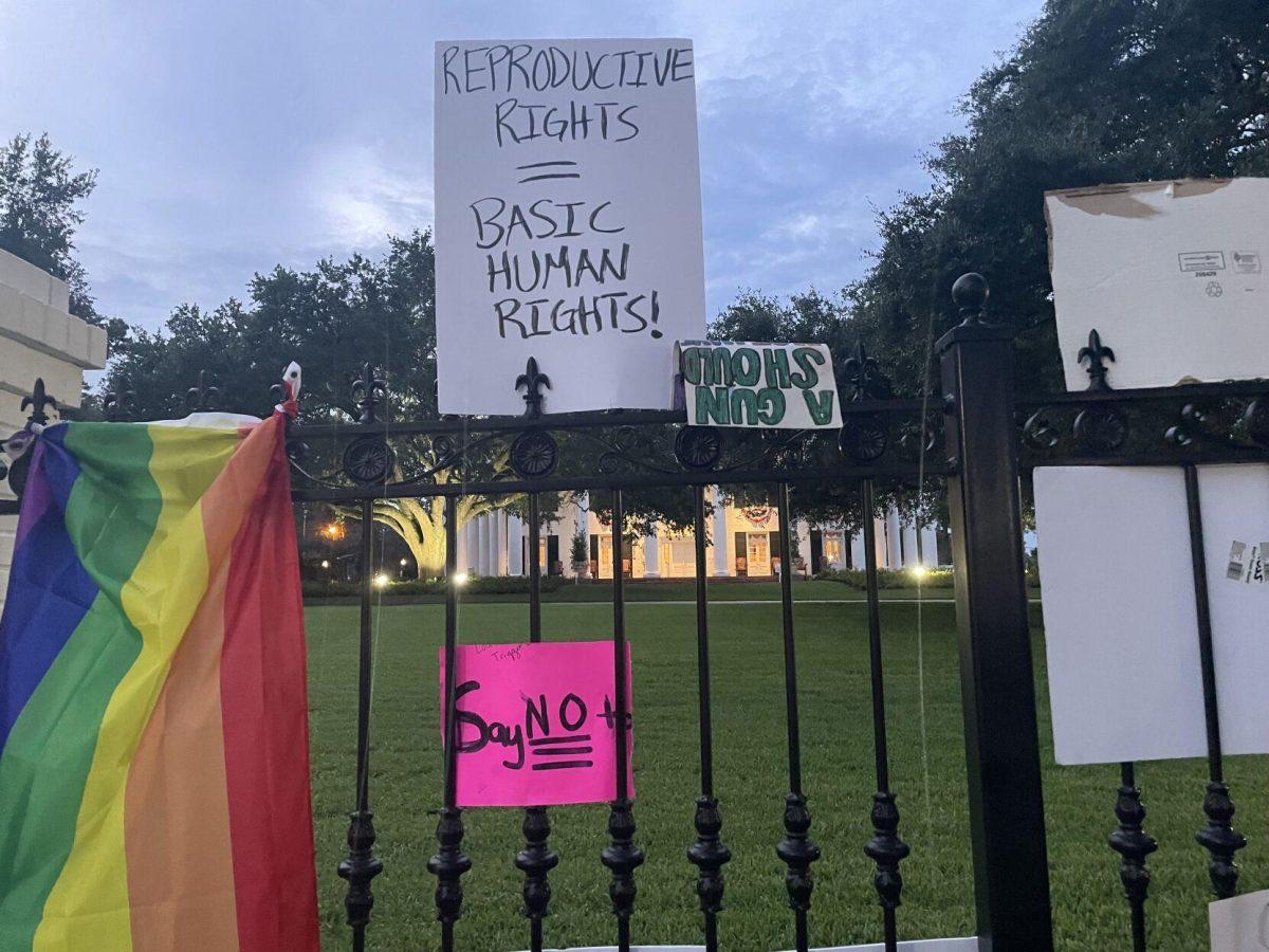 Abortion-rights protestors left their signs on the gate of the Louisiana governor's mansion on June 30, 2022