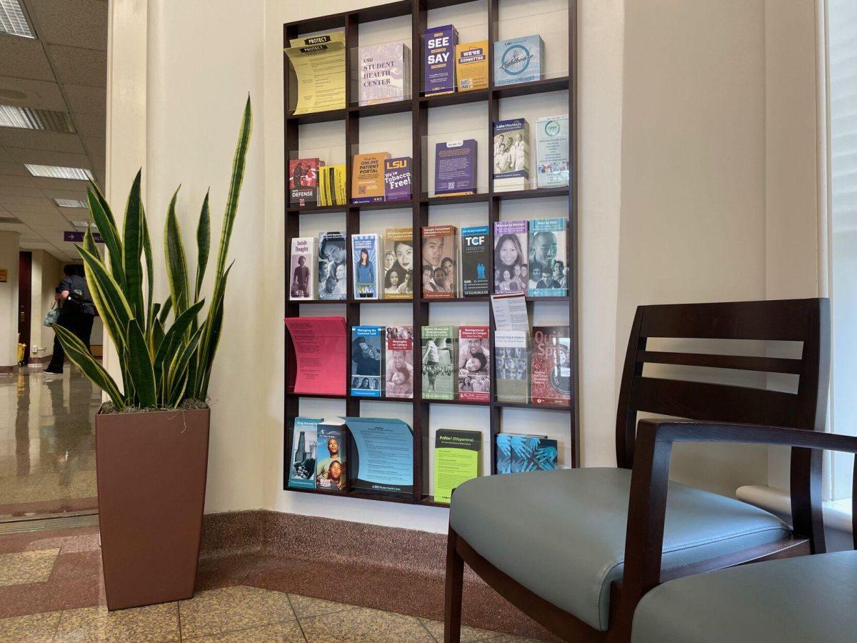 A wall of pamphlets are displayed to students, faculty and staff in the student health center on August 3, 2022.