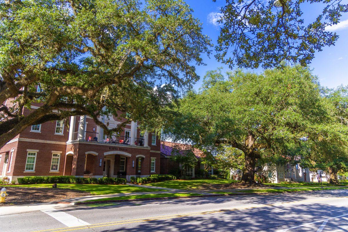 Fraternity houses sit Tuesday, Oct. 9, 2022, in the shade on Fraternity Lane.