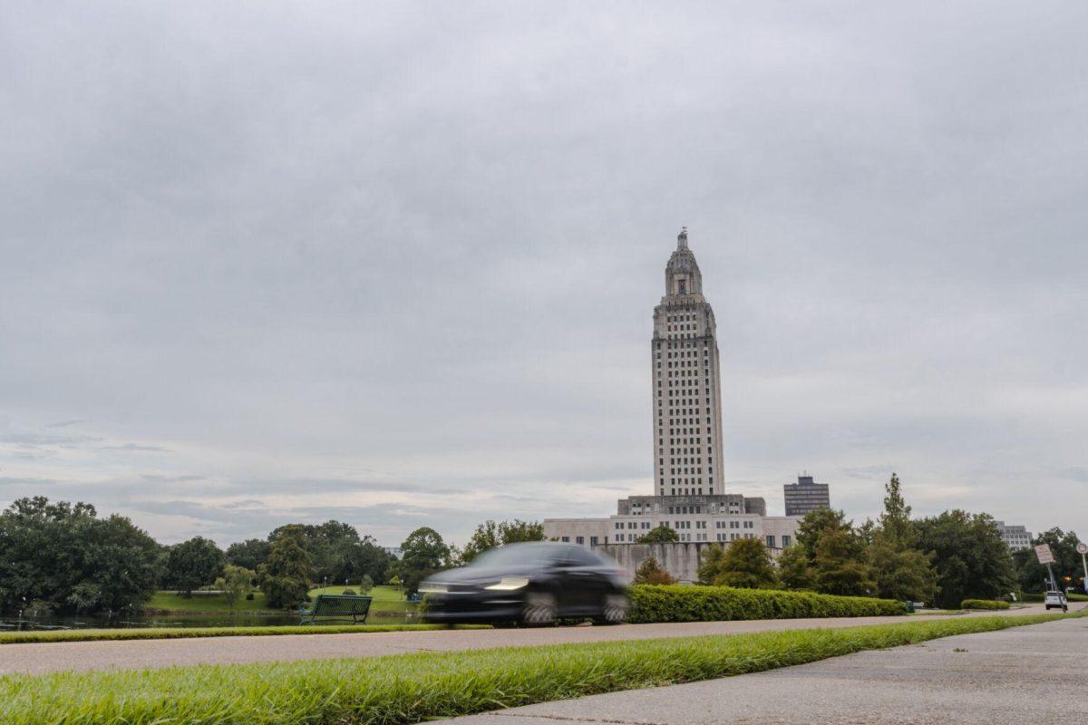 A car speeds down the road on Monday, Aug. 22, 2022, by the State Capitol on North 3rd Street in Baton Rouge, La.