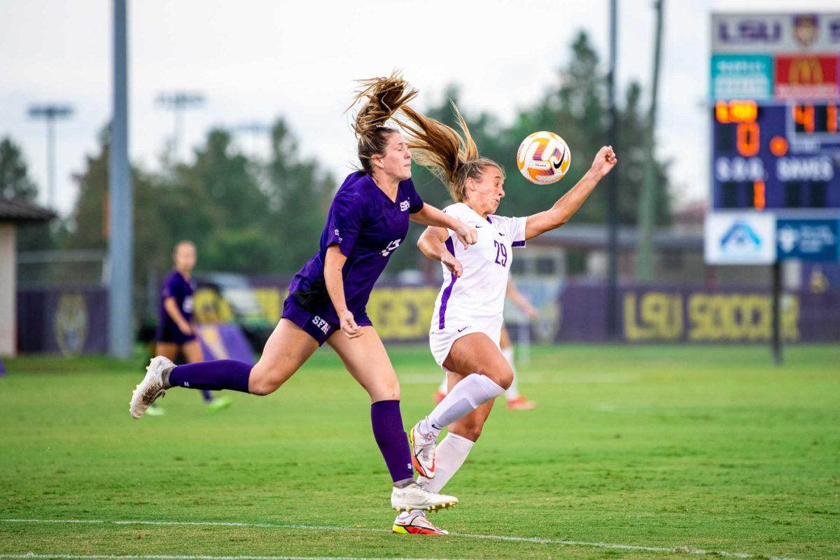 LSU soccer sophomore midfielder Jaden Humbyrd (29) goes for a header Thursday, Aug. 18, 2022, during LSU&#8217;s 5-0 win against Stephen F. Austin at LSU's Soccer Stadium off of Nicholson Drive.