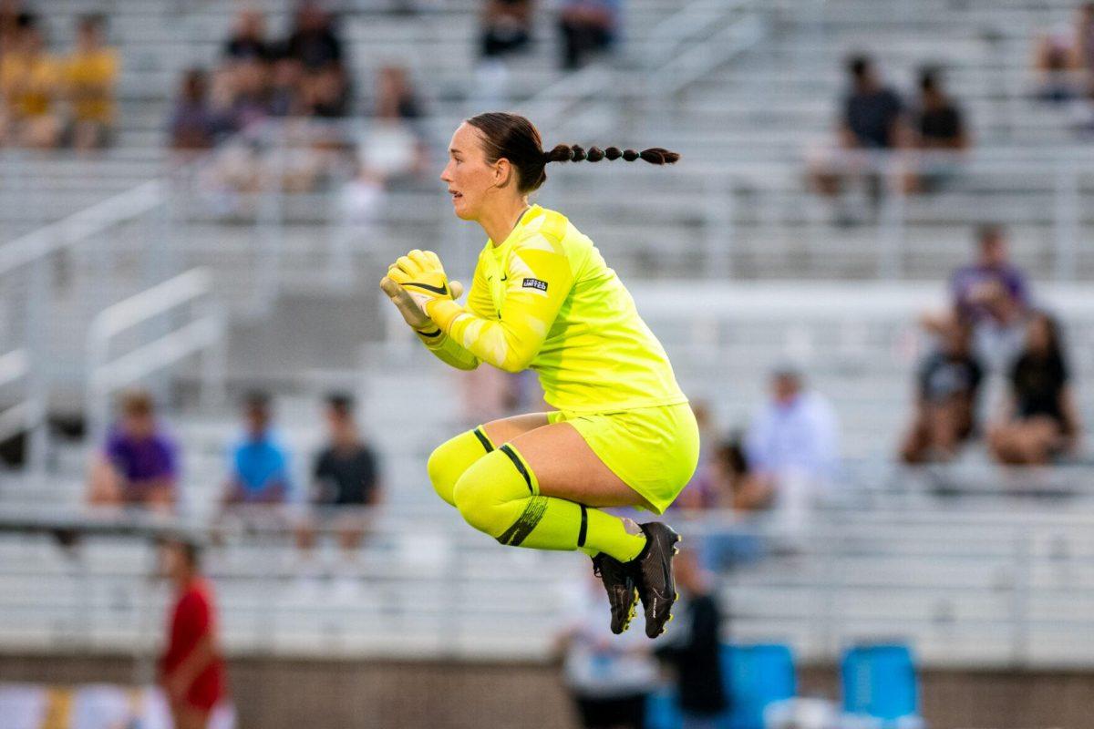 LSU soccer senior goalkeeper Mollee Swift (1) jumps in the air Thursday, Aug. 18, 2022, during LSU’s 5-0 win against Stephen F. Austin at LSU's Soccer Stadium off of Nicholson Drive.