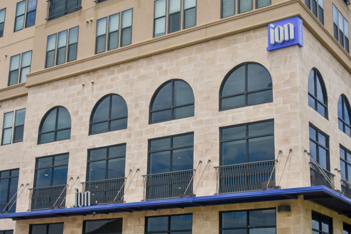 Two Ion Apartment signs sit Friday, August 19, 2022, on the side of the Ion Apartment building on Chimes Street, Baton Rouge, Louisiana.