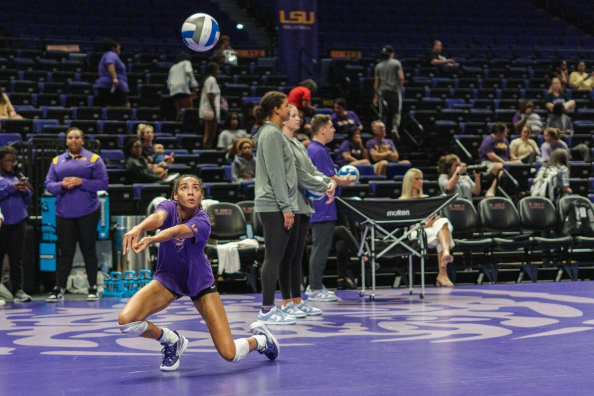 LSU volleyball junior middle blocker Alia Williams (12) practices on Friday, Aug. 26, 2022, prior to LSU&#8217;s 3-1 loss against Houston in the Pete Maravich Assembly Center in Baton Rouge, La.