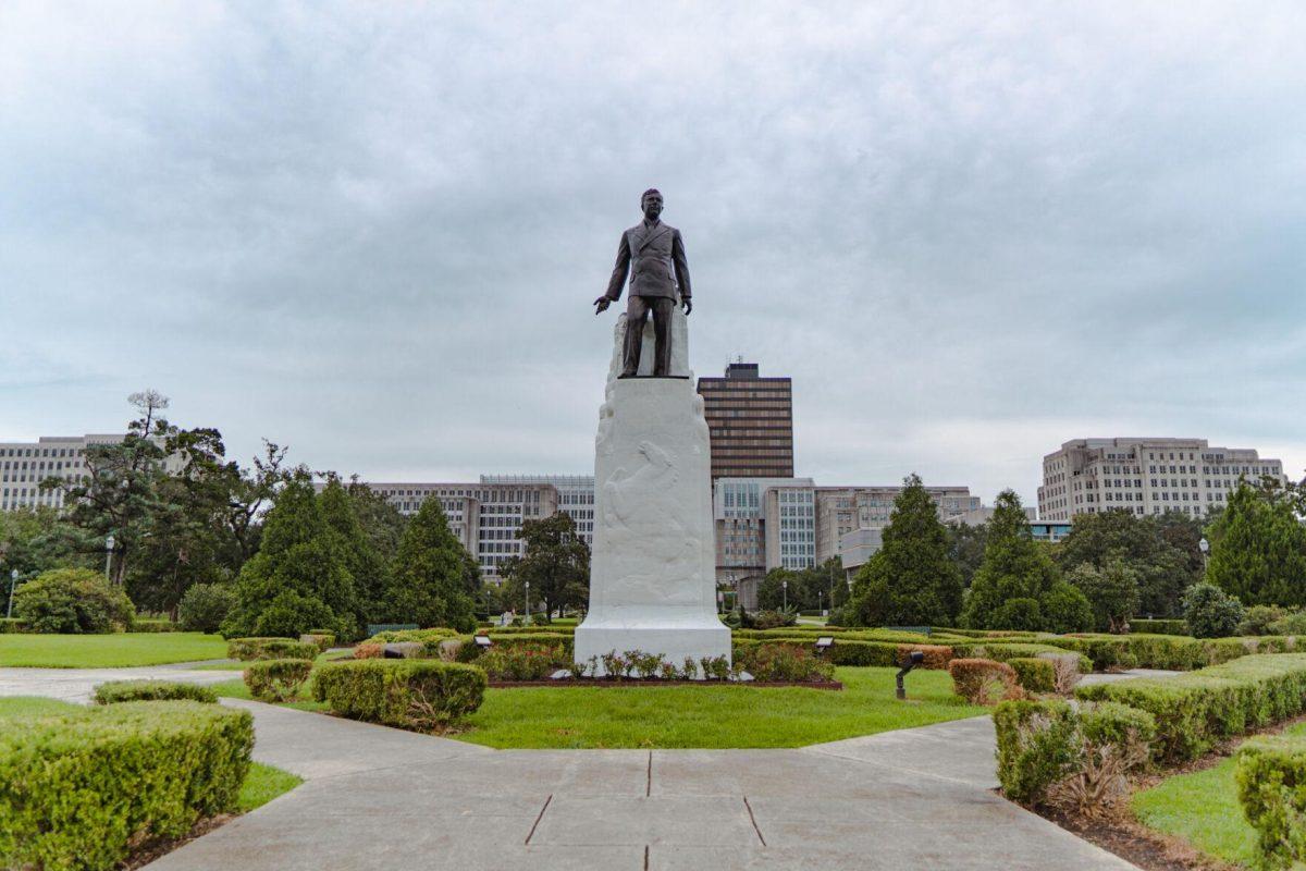 A statue of Huey P. Long sits among plants on Monday, Aug. 22, 2022, on North 3rd Street in Baton Rouge, La.