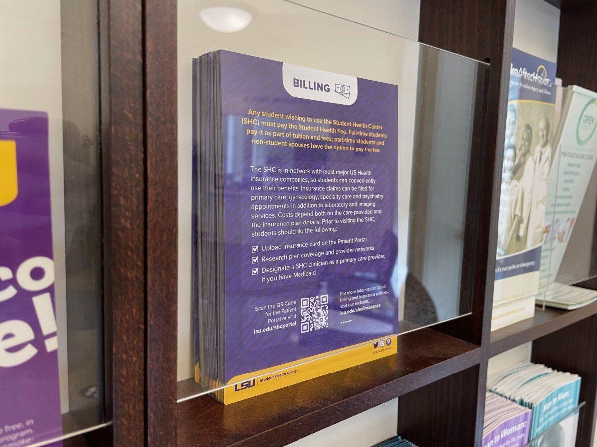 A pamphlet about billing and insurance sits in the student health center waiting room on August 3, 2022.