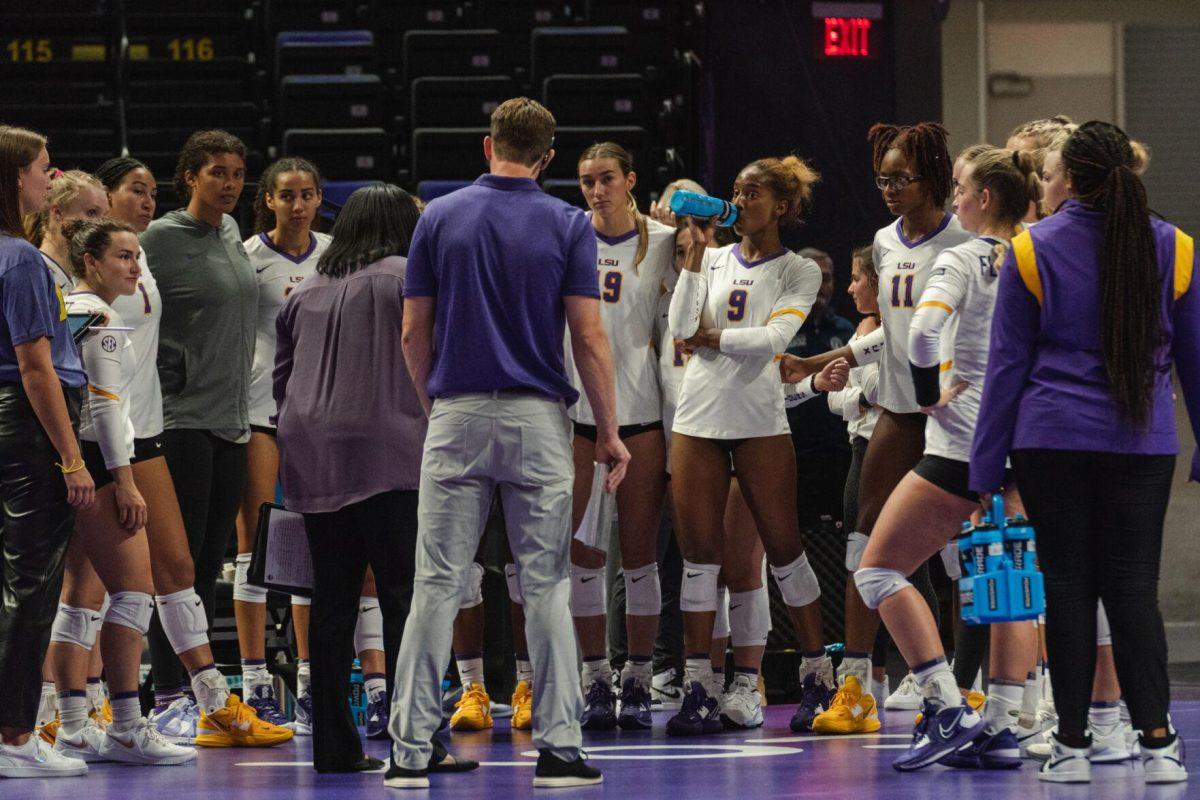 The LSU volleyball team huddles up on the sideline on Friday, Aug. 26, 2022, during their 3-1 loss against Houston in the Pete Maravich Assembly Center in Baton Rouge, La.