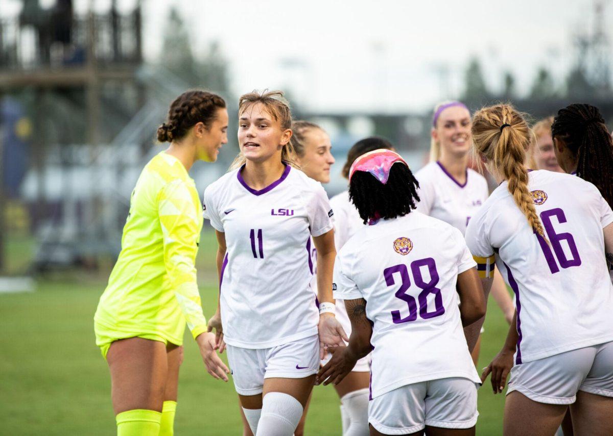 LSU soccer freshman forward Angelina Thoreson (11) claps hands with her teammates Thursday, Aug. 18, 2022, before LSU's 5-0 win against Stephen F. Austin at LSU's Soccer Stadium off of Nicholson Drive.
