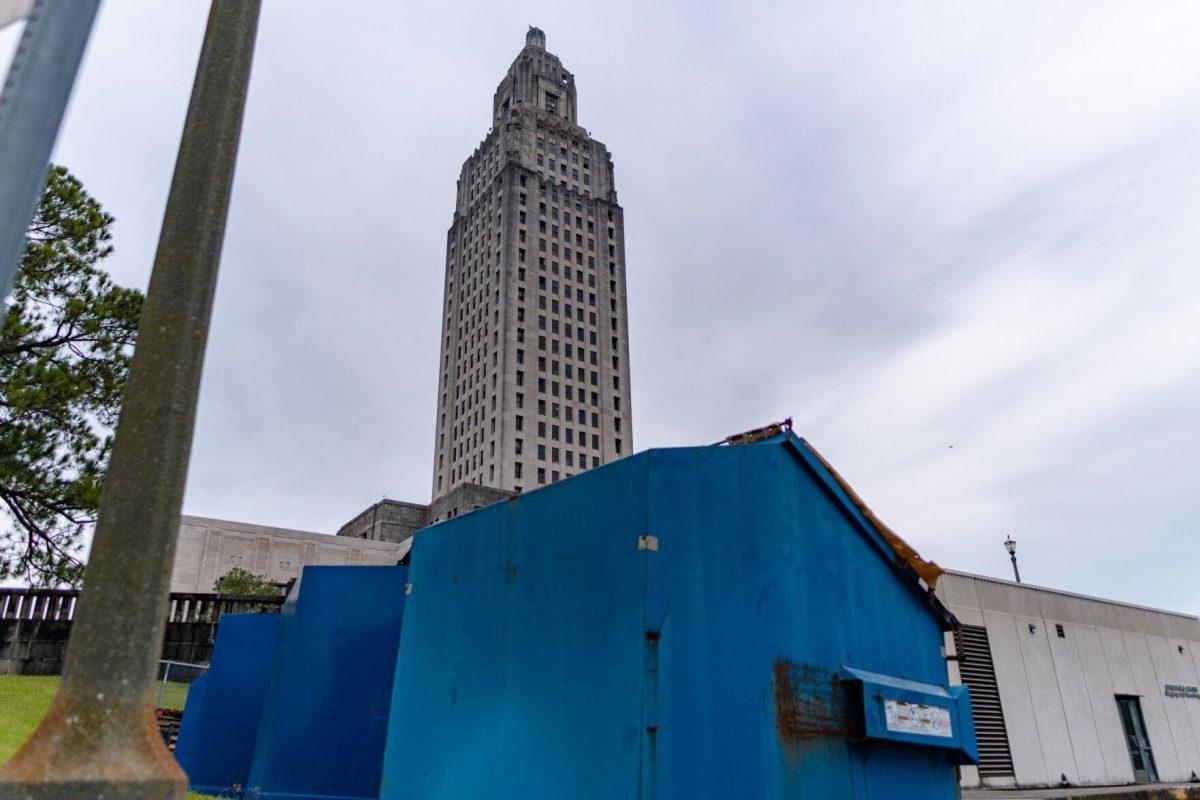 The State Capitol seems to rise out of a dumpster on Monday, Aug. 22, 2022, on North 3rd Street in Baton Rouge, La.