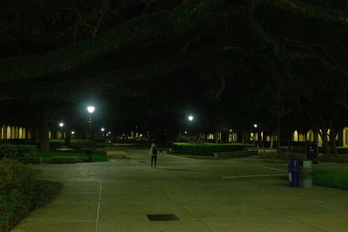 A student walks on Sunday, Aug. 28, 2022, through the Quad in Baton Rouge, La.