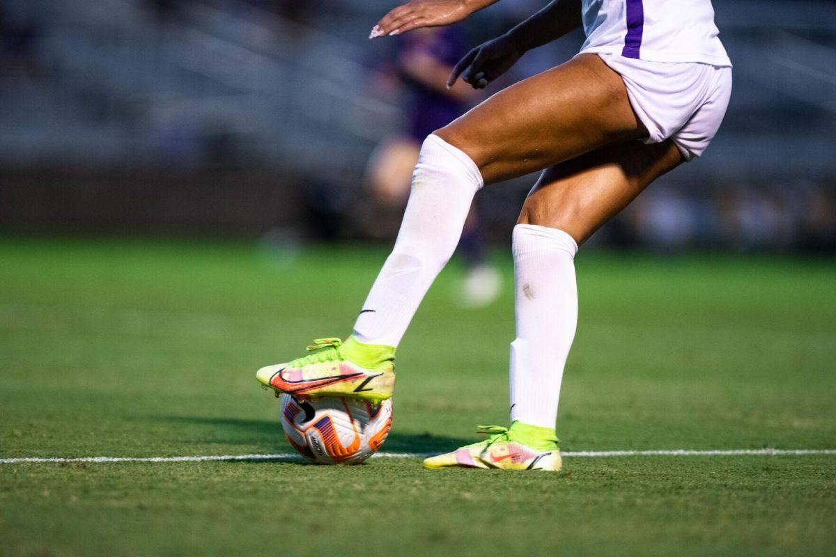 LSU soccer redshirt junior forward Taylor Dobles (13) dribbles the ball Thursday, Aug. 18, 2022, during LSU’s 5-0 win against Stephen F. Austin at LSU's Soccer Stadium off of Nicholson Drive.