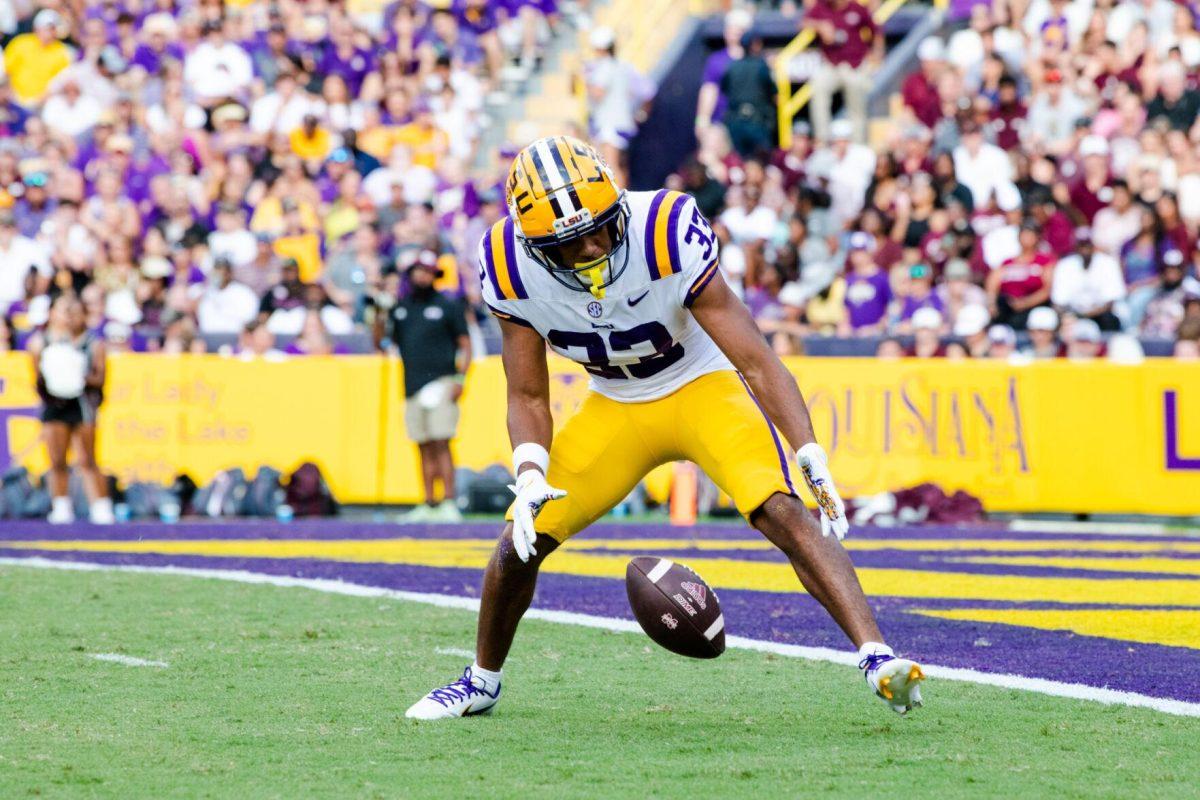 LSU football freshman wide receiver Javen Nicholas (33) picks up the ball Saturday, Sept. 17, 2022 during LSU’s 31-16 win against Mississippi State at Tiger Stadium in Baton Rouge, La.