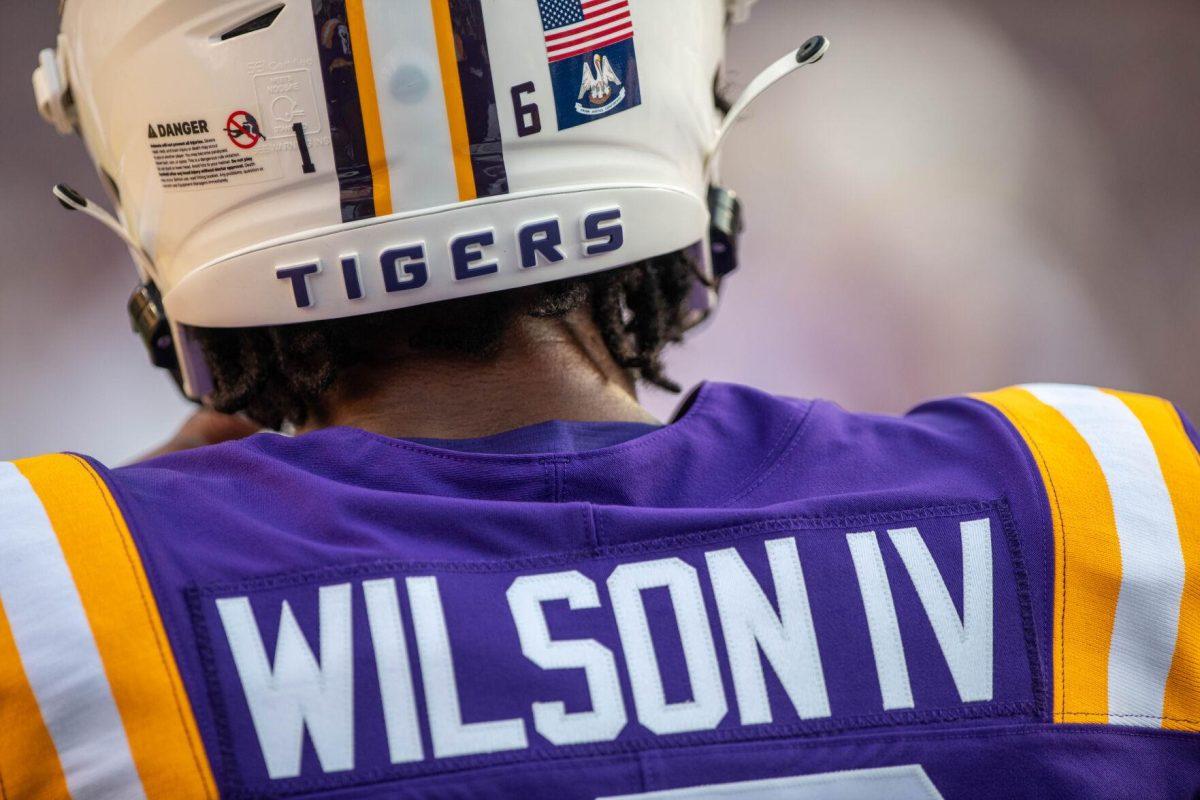 LSU football sophomore safety Quad Wilson (16) waits with other teammates to warm up on Saturday, Sept. 24, 2022, prior to the LSU vs New Mexico game in Tiger Stadium.