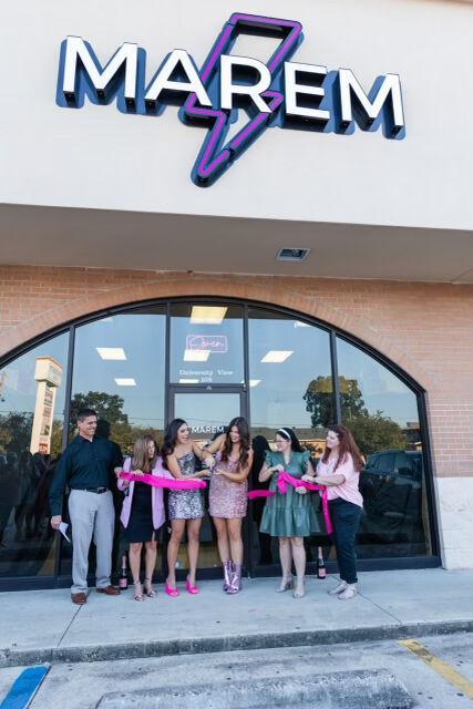 Marlo and Emily Rodrigue cut the ribbon at the opening of the Marem Boutique storefront on Sept. 16, 2022, at 4250, Burbank Dr. in Baton Rouge, La.&#160;