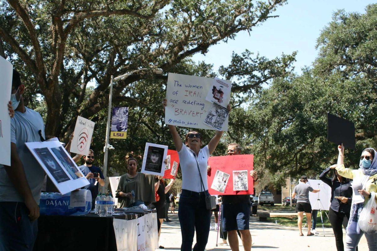 "Woman, life, freedom," is called by advocates for the situation in Iran in Free Speech Alley on Sept. 23, 2022.