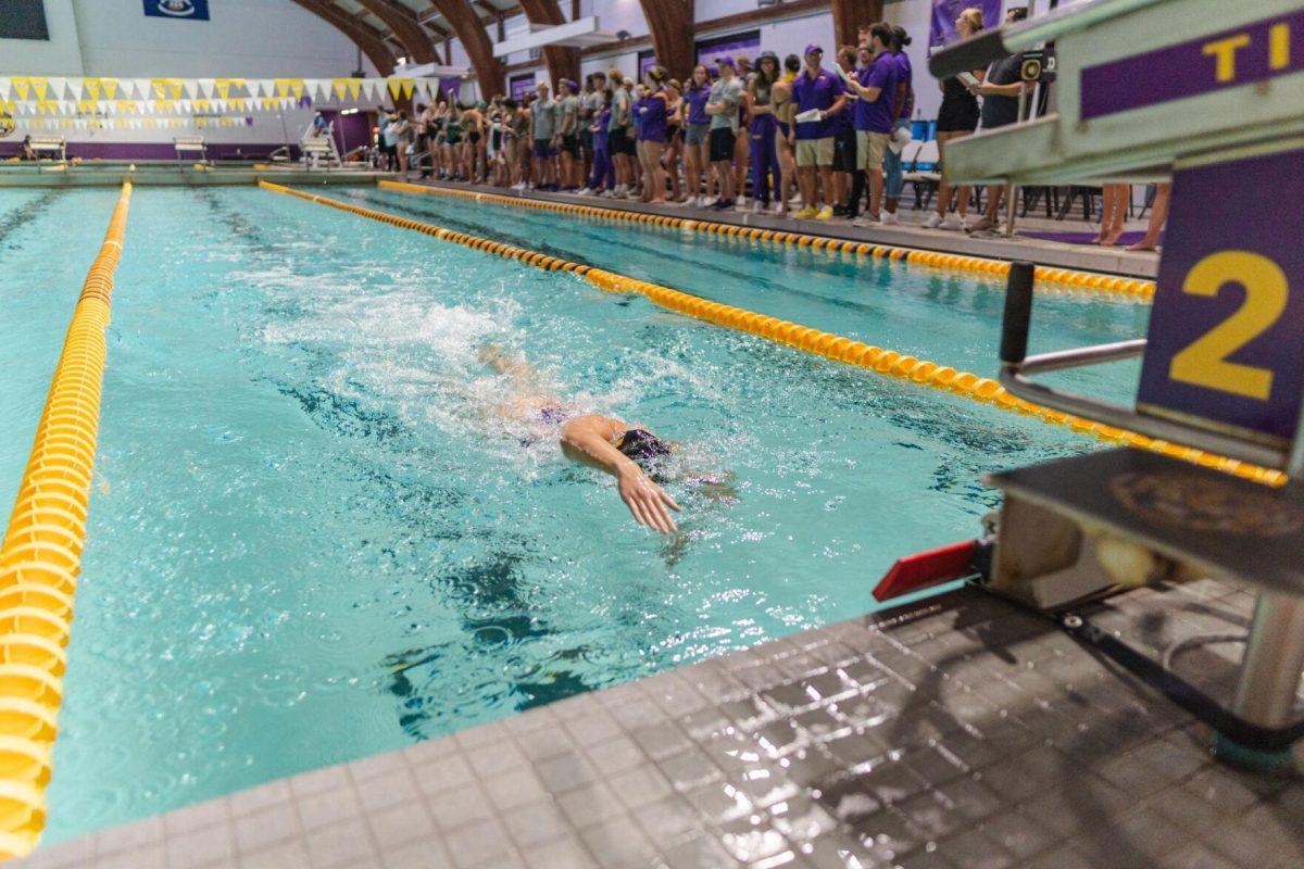 LSU swim sophomore Megan Brama reaches out of the water on Friday, Sept. 23, 2022, during LSU&#8217;s victory over Tulane and Vanderbilt at the LSU Natatorium on Nicholson Drive in Baton Rouge, La.