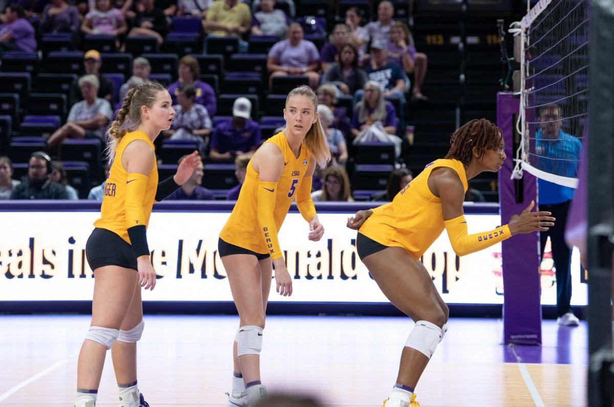 (Pictured left to right) LSU volleyball junior outside hitter Paige Flickinger (2), LSU volleyball graduate student setter Josie Vondran (5), and LSU volleyball senior middle blocker Anita Anwusi (11) line up on Friday, Sept. 2, 2022, during LSU&#8217;s 3-0 victory over Iowa State in the Pete Maravich Assembly Center in Baton Rouge, La.