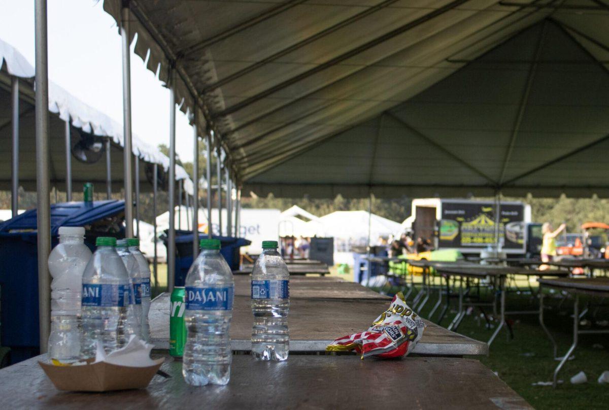 The tables and grass covered in garbage on the LSU Parade Ground after tailgating on Saturday, Sept. 24, 2022, in Baton Rouge, La.