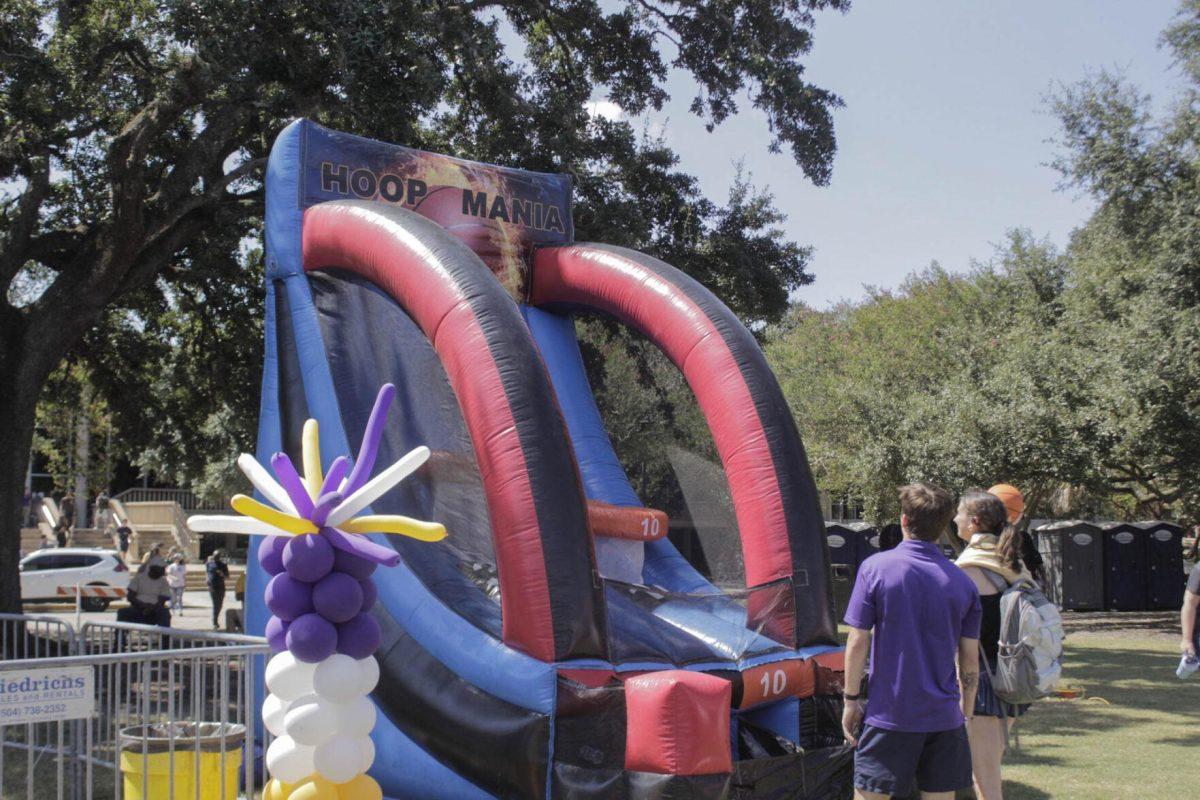 Students shoot hoops at Fall Fest on Friday, Sept. 16, 2022, on the LSU Parade Ground.