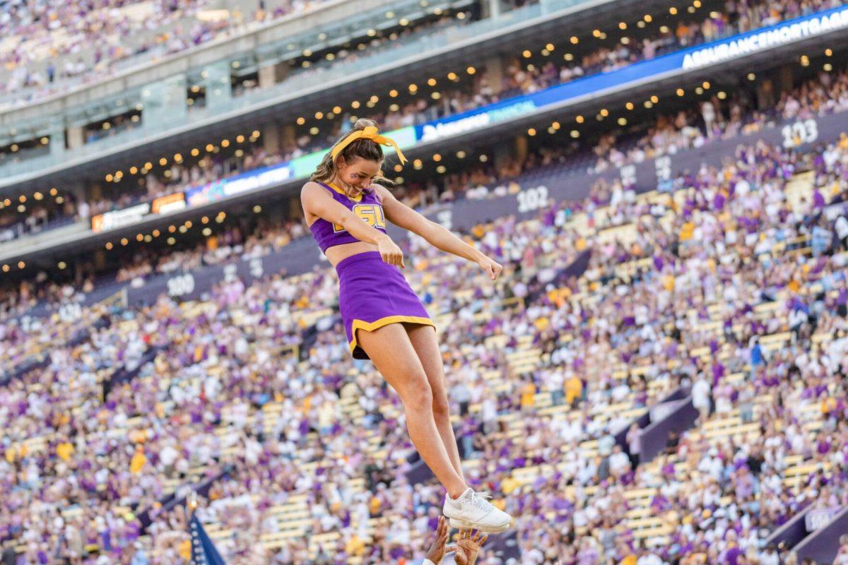 A cheerleader takes to the sky on Saturday, Sept. 10, 2022, before LSU&#8217;s 65-17 win over Southern at Tiger Stadium in Baton Rouge, La.