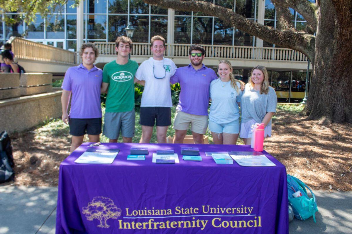 Volunteers for the infraternity council from left to right; Jake Alberts, Andrew Sanli, Andrew Hoover, Brooks Belanger, Olivia Christopher, and Stephanie Loftin pose for a picture on Tuesday, Sept 20, 2022, in Free Speech Alley on LSU's Campus.