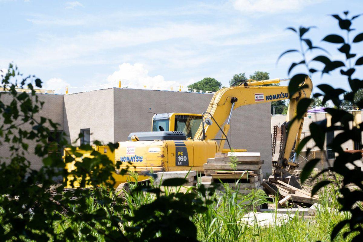 A bulldozer sits Thursday, Sept. 01, 2022, outside the New McKinley School by Edward Gay Apartments on LSU's campus.