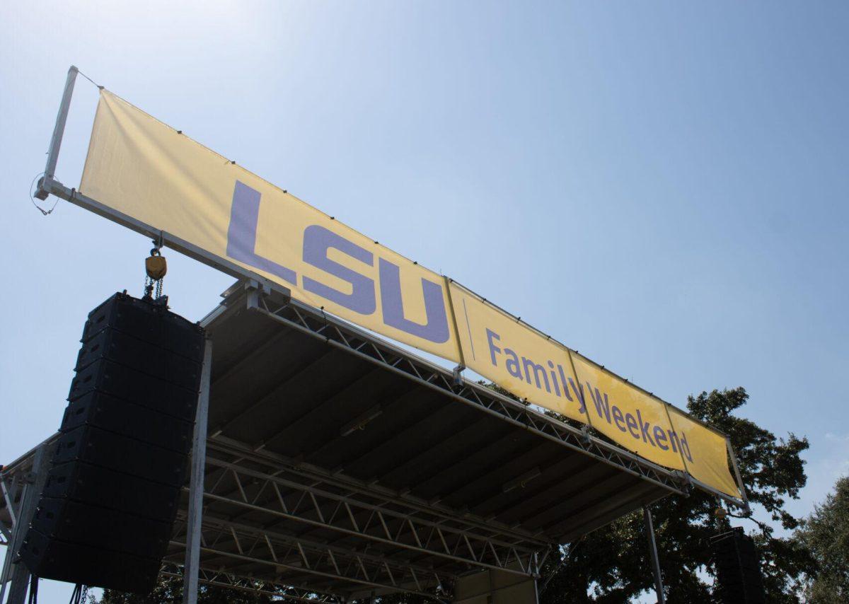 The stage sign welcomes visitors to Family Weekend on Saturday, Sept. 24, 2022, on the LSU Parade Ground in Baton Rouge, La.