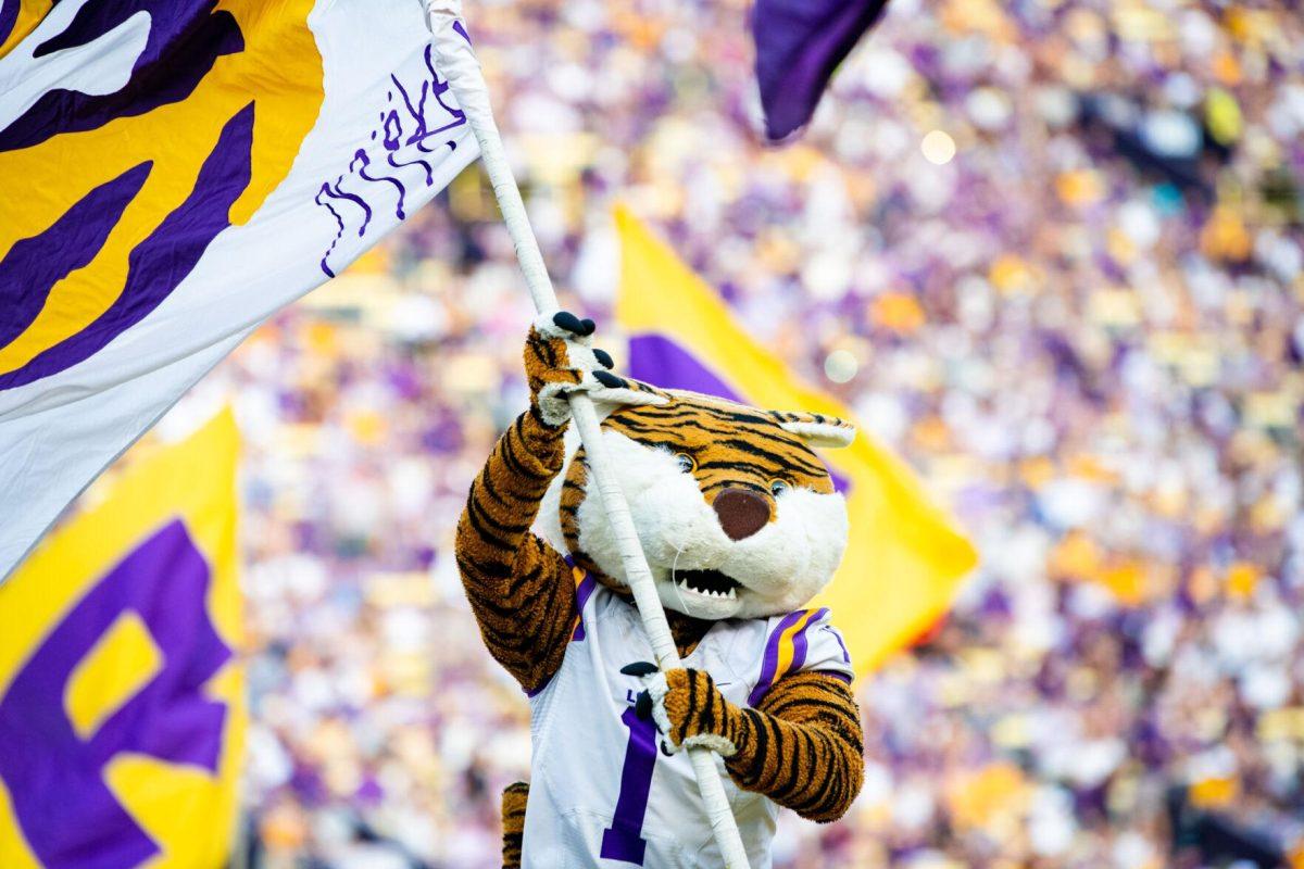 Mike the Tiger runs with a flag after LSU scores a touchdown Saturday, Sept. 17, 2022 during LSU’s 31-16 win against Mississippi State at Tiger Stadium in Baton Rouge, La.
