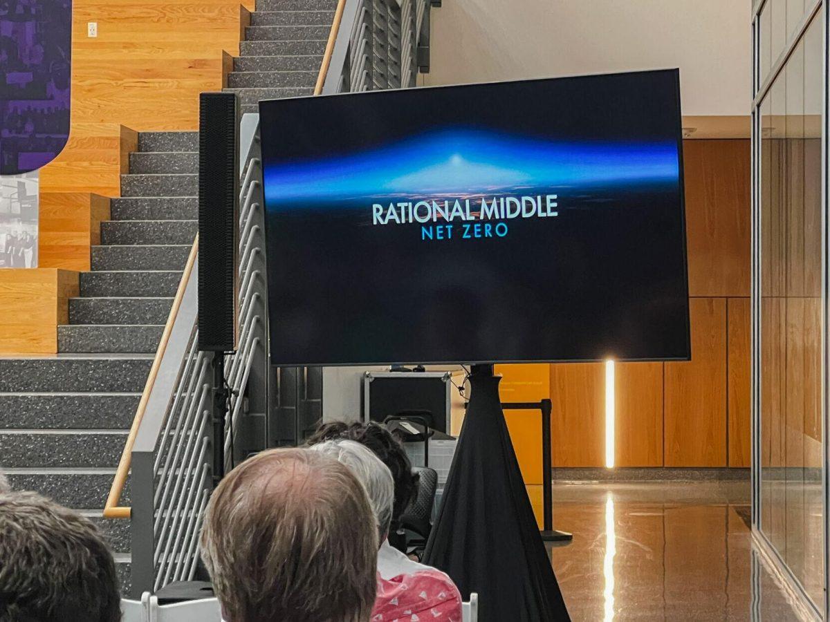 A presentation titled "Rational Middle Net Zero" plays on a tv at the Shell Energy Symposium on September 8, 2022, at Patrick F. Taylor Hall on South Quad Drive in Baton Rouge, La.&#160;