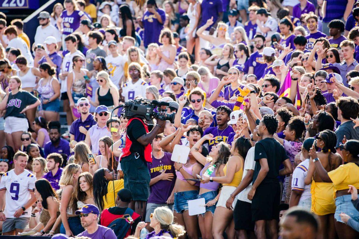 LSU football fans cheer in front of the ESPN camera crew Saturday, Sept. 17, 2022 before LSU’s 31-16 win against Mississippi State at Tiger Stadium in Baton Rouge, La.