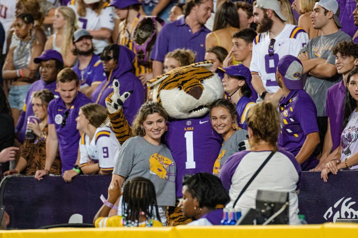 Mike the Tiger poses with fans for a photo on Saturday, Sept. 10, 2022, during LSU&#8217;s 65-17 win over Southern at Tiger Stadium in Baton Rouge, La.