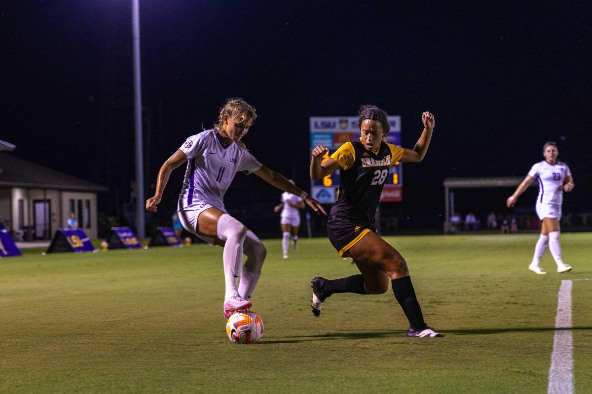 LSU soccer freshman forward Angelina Thoreson (11) jukes a Grambling defender Friday, Sept. 2, 2022, during LSU's 3-1 win against Grambling State University at LSU's Soccer Stadium off of Nicholson Drive.