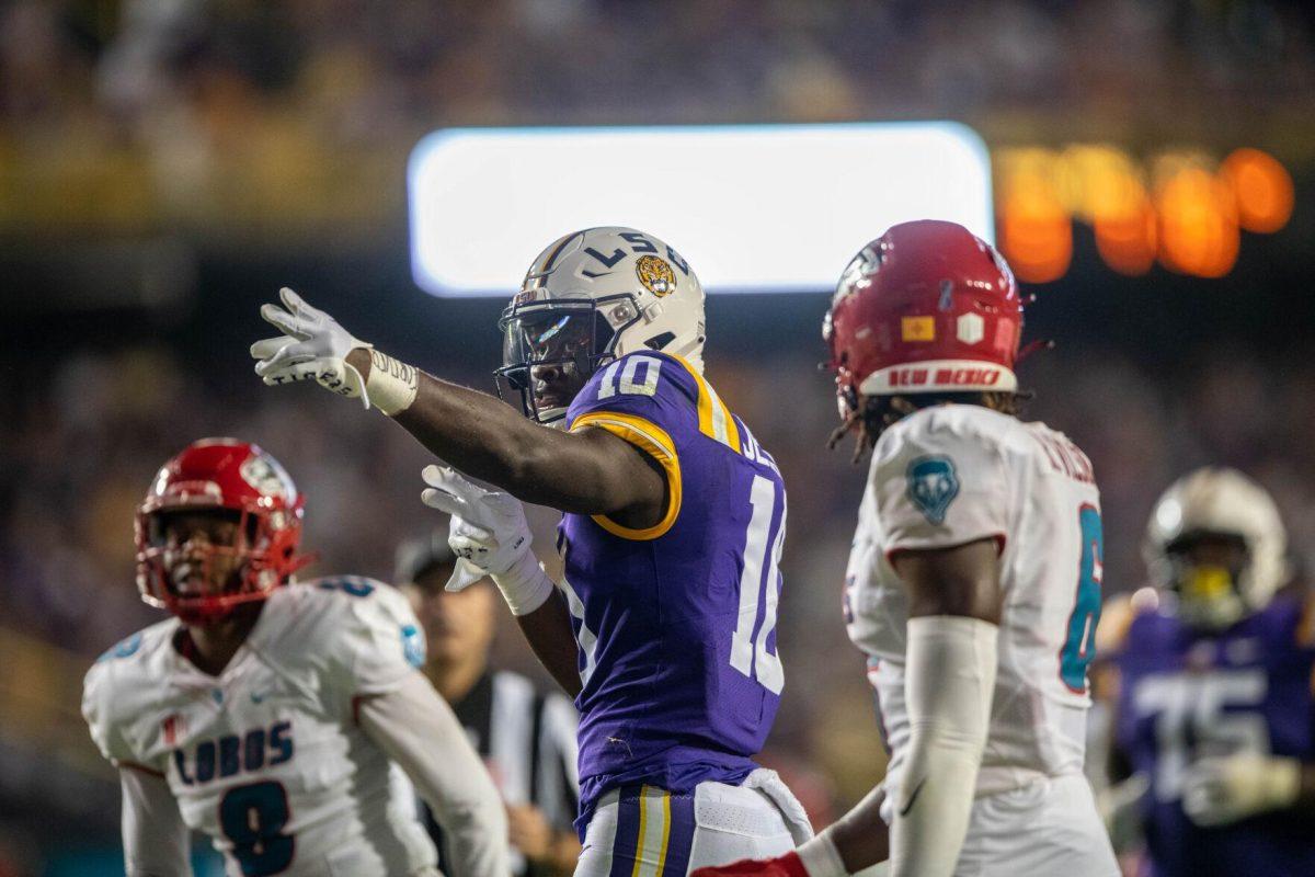 LSU football senior wide receiver Jaray Jenkins (10) poses for the crowd after running the ball towards the end zone on Saturday, Sept. 24, 2022, during the LSU vs New Mexico game in Tiger Stadium&#160;in Baton Rouge, La.