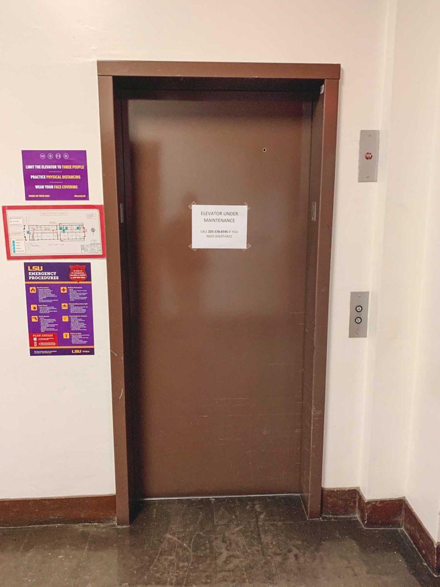 An elevator tacked with a sign labeled "ELEVATOR UNDER MAINTENANCE" sits stationary on Monday, Sept. 19, 2022, inside LSU&#8217;s Audubon Hall in Baton Rouge, La.