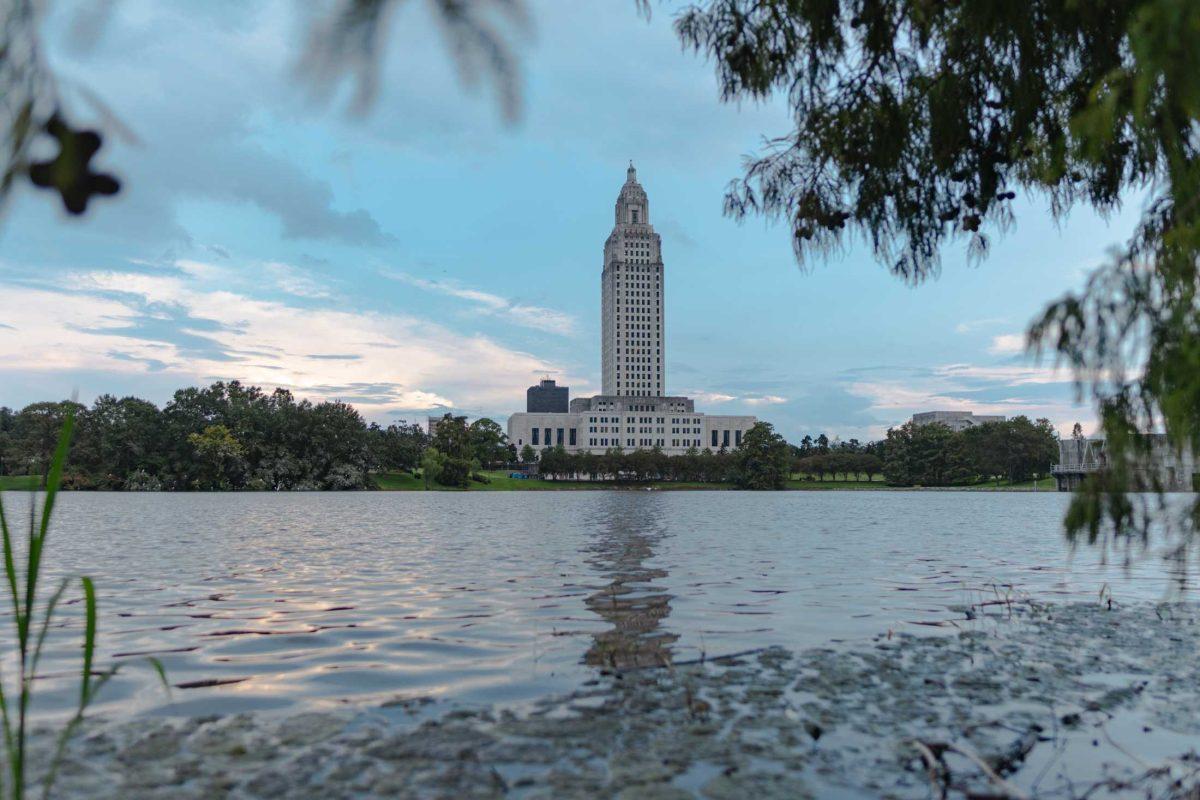 The Louisiana State Capitol sits beyond a lake on Friday, Sept. 2, 2022, on North 3rd Street in Baton Rouge, La.