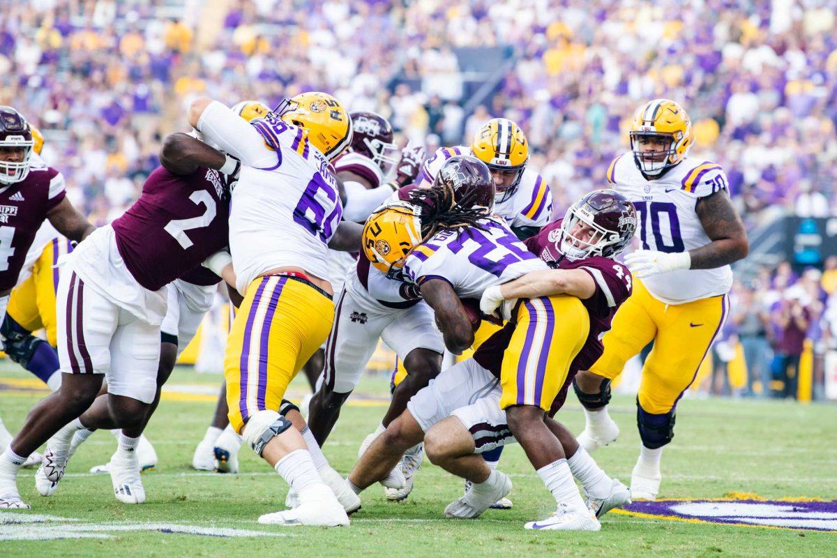 <p>LSU football sophomore running back Armoni Goodwin (22) fights through the Mississippi State defensive line Saturday, Sept. 17, 2022 during LSU’s 31-16 win against Mississippi State at Tiger Stadium in Baton Rouge, La.</p>