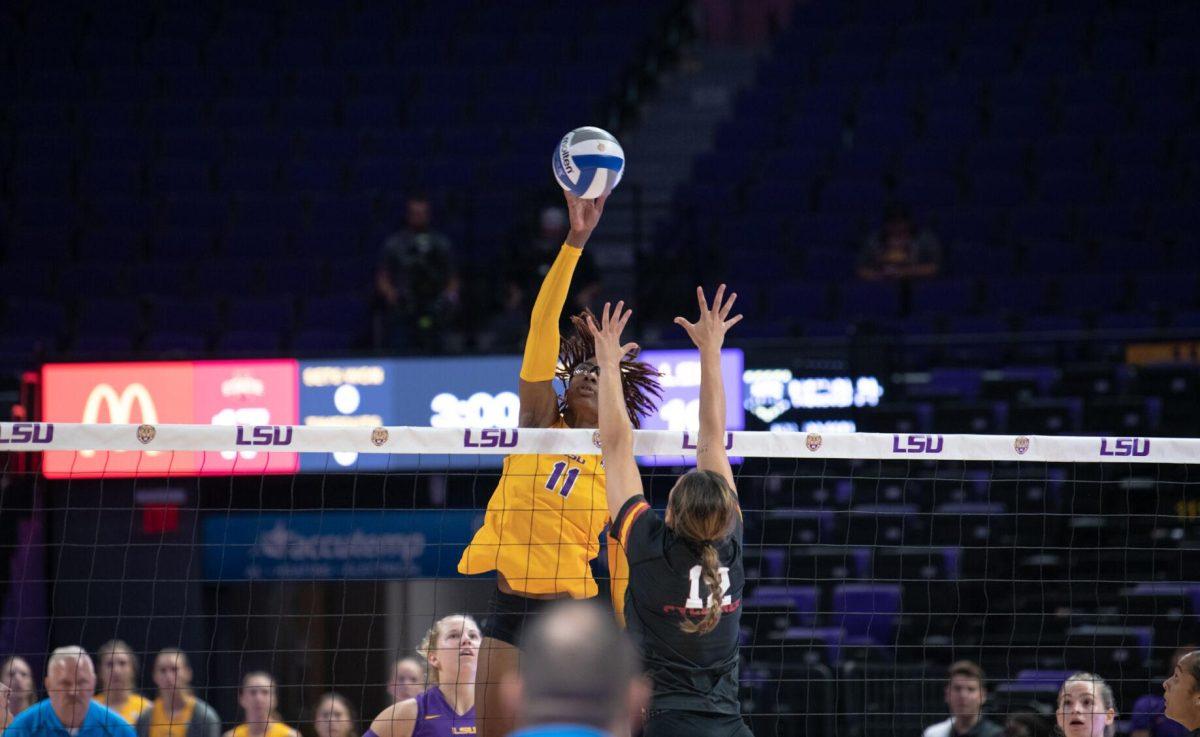 LSU volleyball senior middle blocker Anita Anwusi (11) returns the ball on Friday, Sept. 2, 2022, during LSU&#8217;s 3-0 victory over Iowa State in the Pete Maravich Assembly Center in Baton Rouge, La.