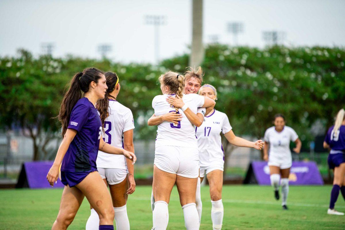 LSU soccer freshman forward Angelina Thoreson (11) hugs redshirt sophomore forward Mollie Baker (3) after she scores Thursday, Aug. 18, 2022, during LSU&#8217;s 5-0 win against Stephen F. Austin at LSU's Soccer Stadium off of Nicholson Drive.