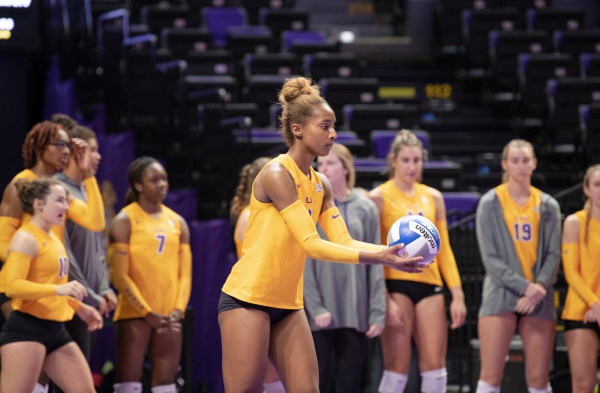 LSU volleyball senior outside hitter Sanaa Dotson (9) prepares to serve the ball on Friday, Sept. 2, 2022, during LSU&#8217;s 3-0 victory over Iowa State in the Pete Maravich Assembly Center in Baton Rouge, La.