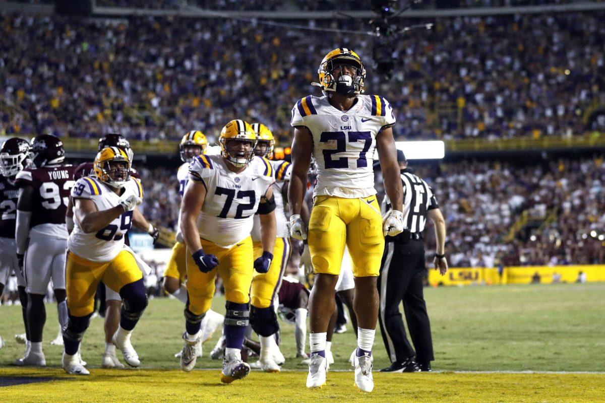 LSU running back Josh Williams (27) and teammates react to his touchdown during the second half of an NCAA college football game against Mississippi State in Baton Rouge, La., Saturday, Sept. 17, 2022. LSU won 31-16. (AP Photo/Tyler Kaufman)